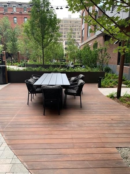 Quiet corner Ipe rooftop deck with plantings