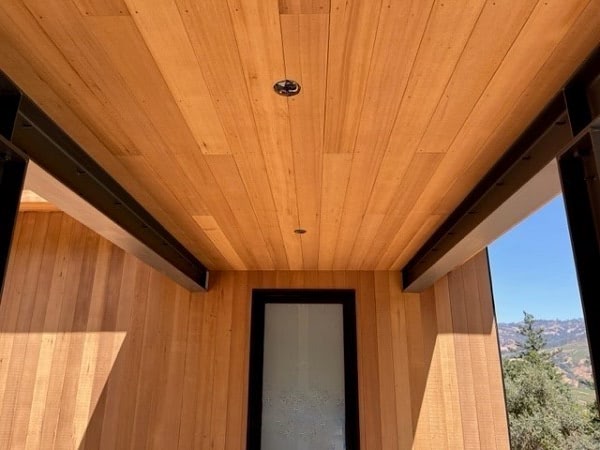 ThermaWood Hem Fir vertical siding and soffits with fire treatement