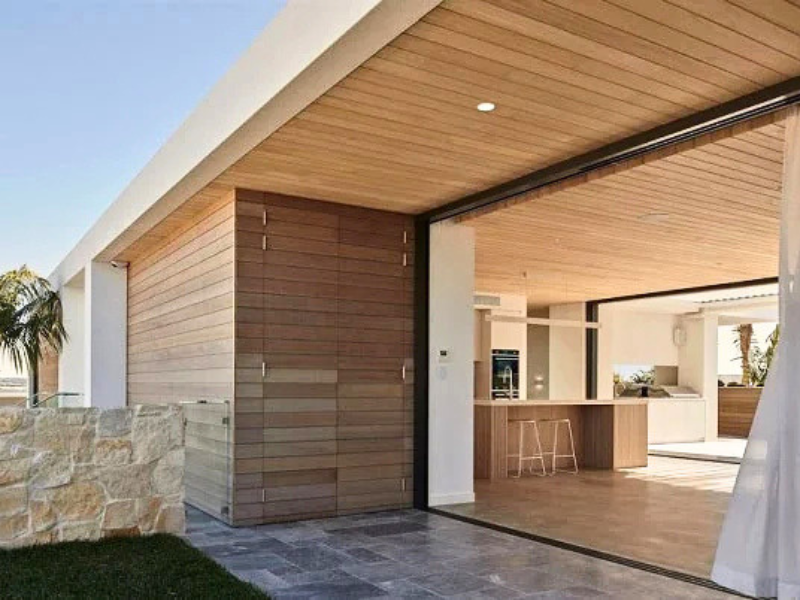 Mataverde Thermally Modified Hem Fir nickel gap A grade siding soffits and interior ceiling through glass pocket doors