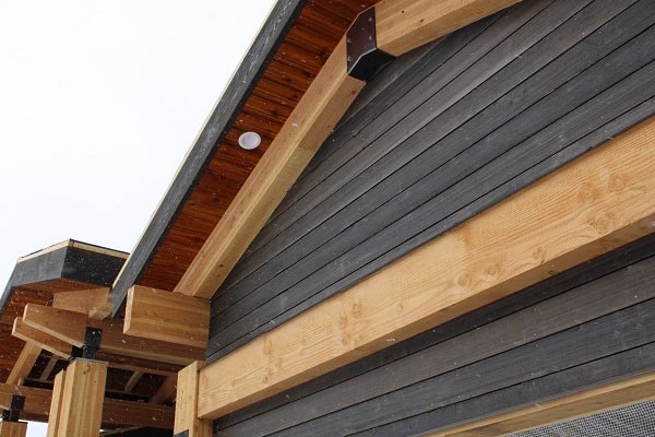 Thermally Modified Hem-Fir TG siding with dark stain