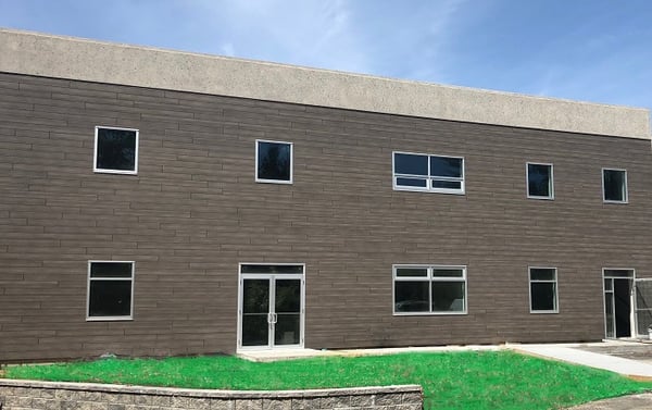 Trespa Pura Aged Ash Wood decor on commercial building in Medway, MA