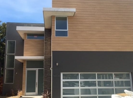 Trespa Pura Classic Oak wood decor siding looks great with stucco and brick-1