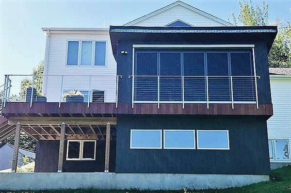 Trespa Pura siding Slate Ebony installed vertically on new addition-1