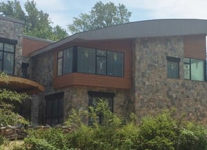Trespa Pura siding accents stonework