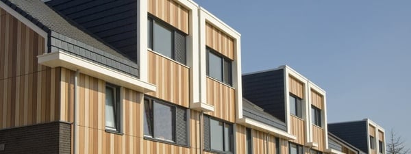 Trespa Pura vertical design for apartments  using multiple colors