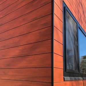 Trespa Royal mahogany wood decor with black trim