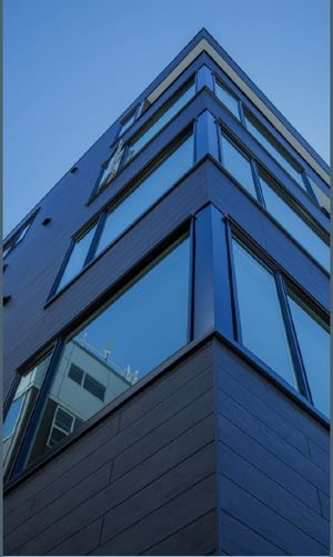 Pura NFC Slate Ebony wood decor on apartment building