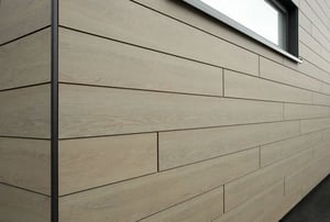 Trespa Pura NFC siding Siberian Larch wood decor with black trim