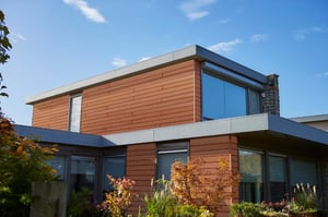 Trespa Pura NFC Romantic Walnut wood decor on modern home