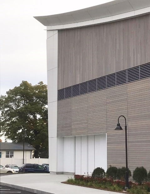 Vertical and horizontal Ipe rainscreen siding on Providence College