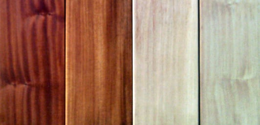 Sample planks of Garapa hardwood shown with sealer and without