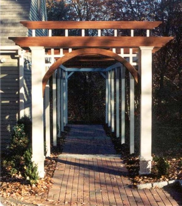 Ipe hardwood design feature pergola arbor over a brick walkway