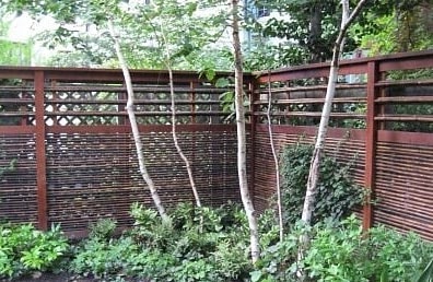 Premium Ipe hardwood with bamboo in a garden privacy wall