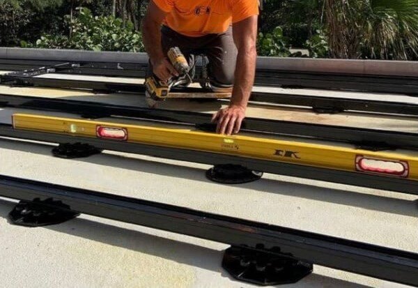 Eurotec Rooftop Decking System from Mataverde being installed using the twin fastener components