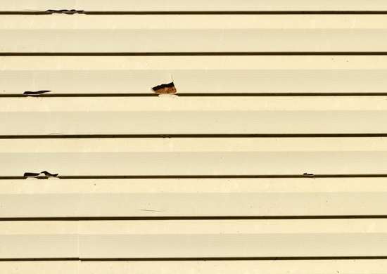 cracked vinyl siding