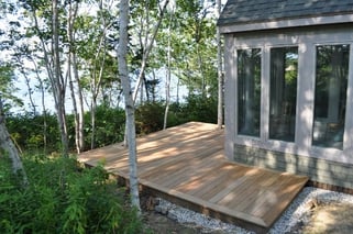 Garapa deck on a tiny home in the Maine woods by the ocean from Mataverde Decking