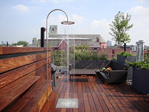 Ipe hardwood rooftop deck with waterfall shower