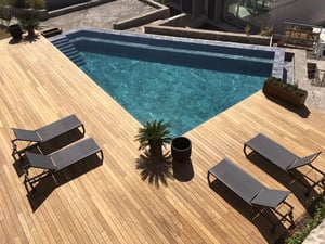 Thermally modified wood decking around pool