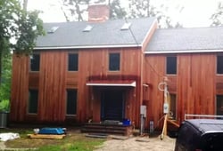 unique-wood-rain-screen-design-transforms-curb-appeal-of-colonial-home