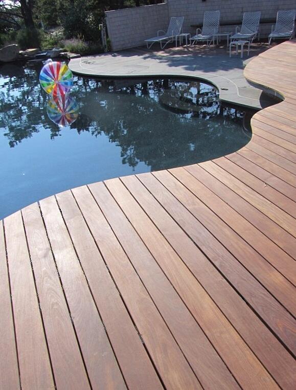 real ipe wood deck poolside with curved edge