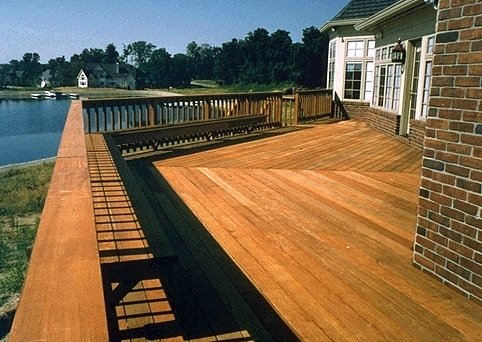 Ipe hardwood deck with built in benches and a harbor view