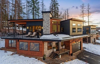 thermally modified wood rooftop deck and rainscreen siding on ski cabin in snow blog image