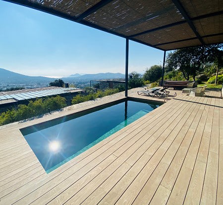 thermally modified wood decking at rooftop deck with pool
