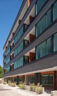 Trespa Pura siding clads apartment building