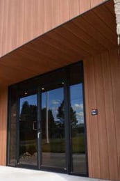 trespa pura installed vertically at fascia, soffits and sidewalls.jpg