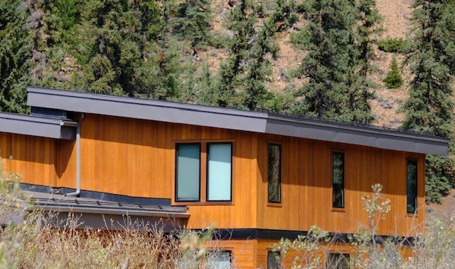 Thermally Modified Hem-Fir fire rated siding on a house exterior looks like cedar