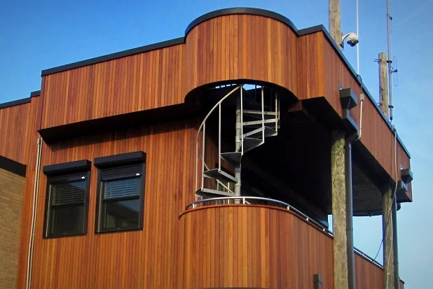 Installing a Wood Rain Screen Vertically on a Curved Wall